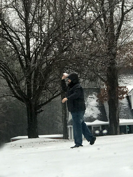 the grandson of the two RV Gypsies throwing a snowball